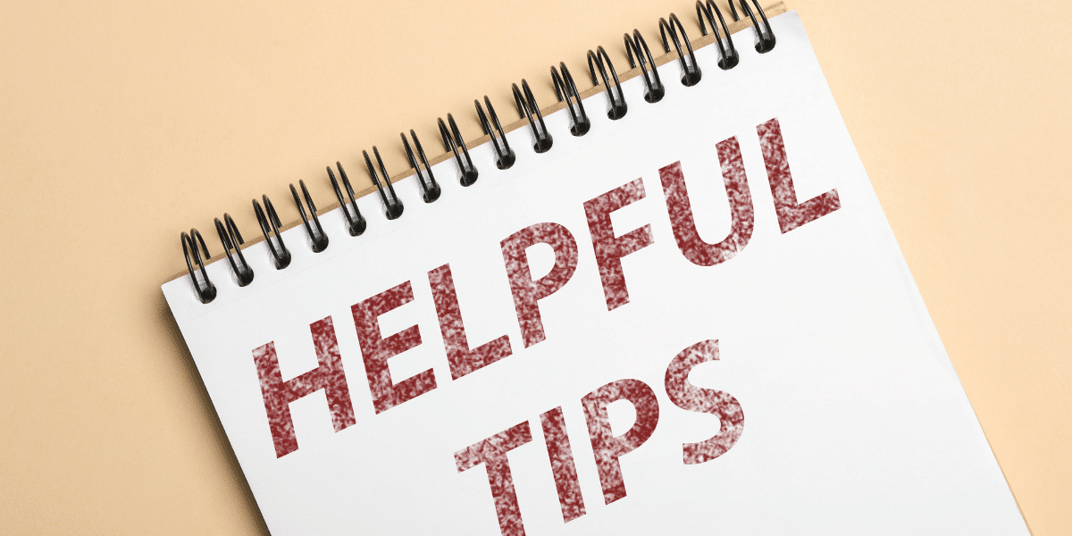 A notebook with the words "helpful tips" written on it.